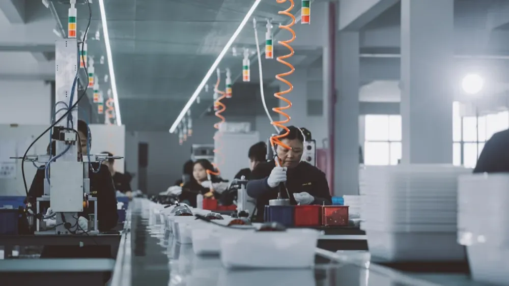 Workers on a modern production line